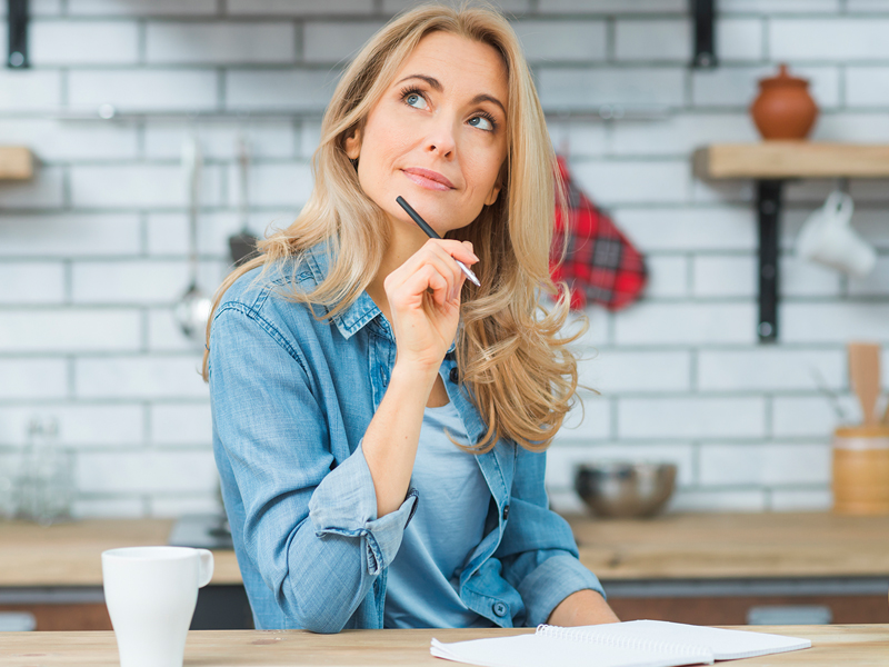 pensive woman thinking about tax