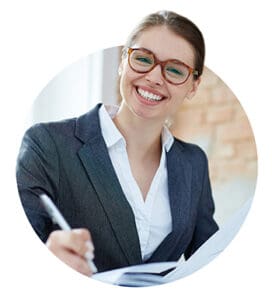 inancier wearing eyeglasses with papers making notes in notebook in office