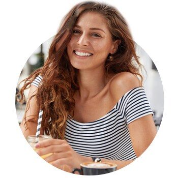 Professional portrait of a smiling individual photographed indoors